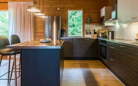 Lammassaari: Møbel, Indretning, Gulvbelægning, Træ, Køkken, Trægulve, Countertop, Loft, Etage, Hjem