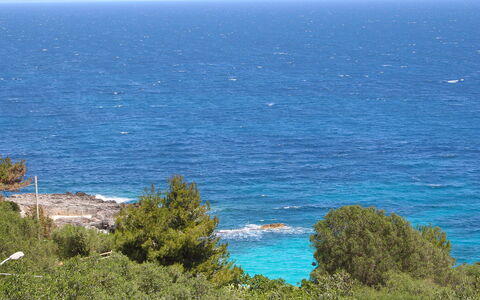 Castro 550: Krop Af Vand, Kyst, Hav, Himmel, Ocean, Coastal Og Oceaniske Landskabsformer, Blå, Vegetationen, Headland, Promontory