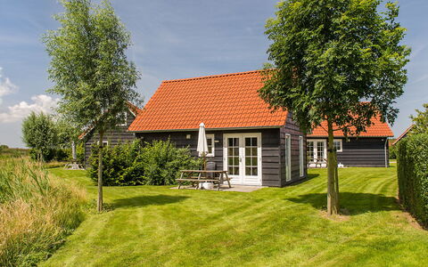 Wemeldinge 200: Himmel, Plante, Sky, Bygning, Ejendom, Træ, Naturlige Landskab, Land Lot, Vegetationen, Græs