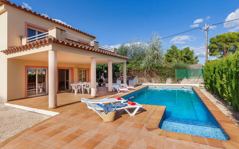 Villa Cala Nova B: Himmel, Ejendom, Vand, Bygning, Plante, Azure, Træ, Svømmepøl, Udendørs Møbler, Sky