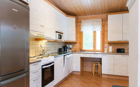 Hot Pool Cottage Iitu: Køkken, Countertop, Træ, Køkken Apparat, Gulvbelægning, Indretning, Cabinetry, Større Bandage, Møbel, Loft
